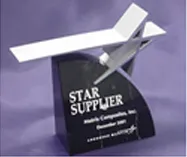 A star supplier award with a plane on it.