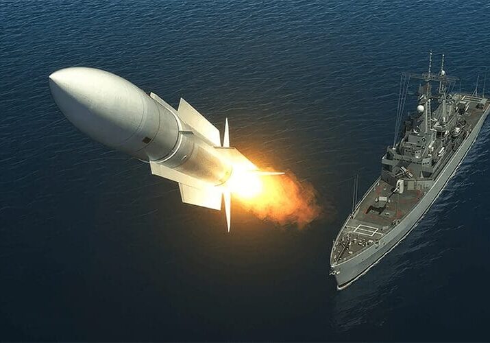 A rocket is being fired from the ocean.